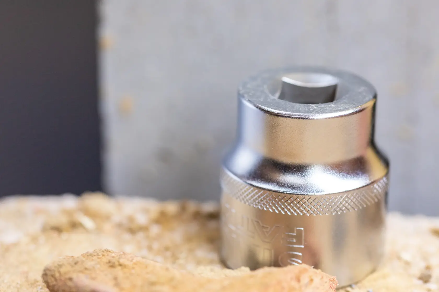 STANLEY FMMT17232-0 chrome socket tool, photography of socket on sandy surface
